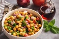 Chickpea salad with green pepper, red onion and vinaigrette dressing.