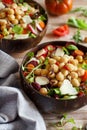 Chickpea salad with vegetables and microgreens