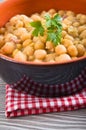 Chickpea soup in terracotta bowl. Royalty Free Stock Photo