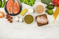 Chickpeas, fish, eggs, cheese and vegetables on a light background, flat lay. The concept of proper nutrition, a Royalty Free Stock Photo