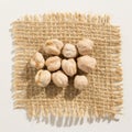 Chickpeas legume. Close up of grains over burlap.