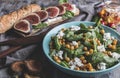 Chickpeas and veggies salad with spinach leaves, homemade cottage cheese.Healthy vegan food,sandwich with figs, diet dish