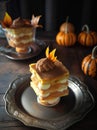 Chicory pumpkin tiramisu a stack of desserts sitting on top of a silver plate, Royalty Free Stock Photo