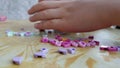 A chidren Playing with lego brick