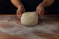 Chief baker preparing dough for bread in a bakery. Kitchen professional. Royalty Free Stock Photo