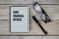 Chief Financial Officer (CFO) text on notepad, Business and Financial concept background Royalty Free Stock Photo