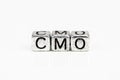 Chief Marketing Officer CMO concept with cubic metal letters Royalty Free Stock Photo