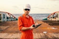 Chief officer on deck of ship or vessel with checklist Royalty Free Stock Photo