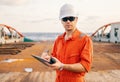 Chief officer on deck of ship or vessel with checklist Royalty Free Stock Photo