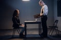 The chief of the police Department charges a detained white man with tattoos on his face in an interrogation room. A man Royalty Free Stock Photo