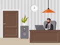 Chief s office. Boss in suit and glasses, working on laptop. Table, safe, chair, potted plant, clock and lamp. Office interior. Royalty Free Stock Photo