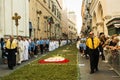 Priests and scouts in the religious procession of Corpus Domini