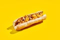 Chiken cheesesteak in minimal style. American fast food in yellow background with shadow. Philly steak sandwich trendy concept. Royalty Free Stock Photo