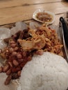 Chiken rice mix served wiyh peanut and sambal matah the traditional food from bali