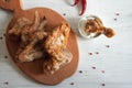 Chiken wings with sour creme Royalty Free Stock Photo