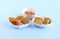 Chikki Indian Sweet Dish and its Main Ingredient Peanuts Royalty Free Stock Photo