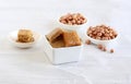 Chikki Indian Sweet Dish and Peanuts in Bowls