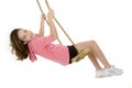 Caucasian child playing on a swing Royalty Free Stock Photo