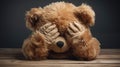 Child abuse concept. Teddy bear covering eyes