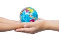 Child and Adult Holding a World Globe in Hands Royalty Free Stock Photo