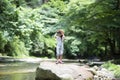 Child adventures in a mountain stream Royalty Free Stock Photo