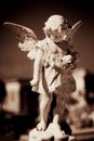Child angel statue in a cemetery Royalty Free Stock Photo