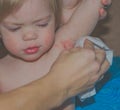 The child in the armpit inflammation, mum wiping cloth