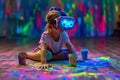 A child artist paints while wearing a virtual reality headset.