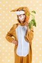 Child as easter hare with carrot Royalty Free Stock Photo