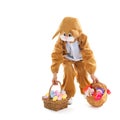 Child as easter hare with eggs and flowers Royalty Free Stock Photo