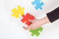 a child with autism collects puzzles,teaching children Royalty Free Stock Photo