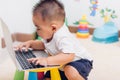 Child baby boy working using laptop computer Royalty Free Stock Photo