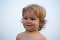 Child baby face close up. Funny little child closeup portrait. Blonde kid, emotion face. Royalty Free Stock Photo