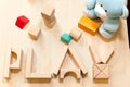 Child or baby play set, toy wooden blocks, teddy bear. Kindergarten or preschool background Royalty Free Stock Photo