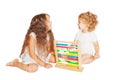 Child and baby playing with abacus Royalty Free Stock Photo