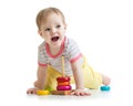 Child baby playing with color pyramid toy Royalty Free Stock Photo