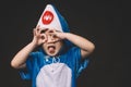 Child with baby shark costume