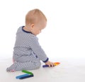 Child baby toddler sitting drawing painting with colour pencils Royalty Free Stock Photo