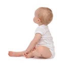 Child baby toddler sitting facing backwards Royalty Free Stock Photo