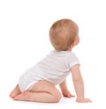 Child baby toddler sitting facing backwards back rear view Royalty Free Stock Photo