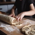 the child bakes delicious cookies, rolls out the dough, cooking,