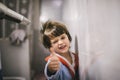 Child after the bath comes he dries his hair