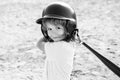 Child batter about to hit a pitch during a baseball game. Kid baseball ready to bat. Royalty Free Stock Photo