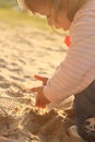 Child beach playing alone sand spring clothes