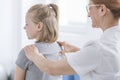 Child being given back massage Royalty Free Stock Photo