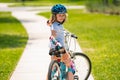 Child on bicycle outdoor. Boy in a helmet riding bike. Little cute adorable caucasian boy in safety helmet riding bike Royalty Free Stock Photo