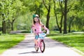 Child on bike. Kids ride bicycle. Girl cycling. Royalty Free Stock Photo