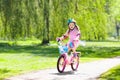 Child on bike. Kids ride bicycle. Girl cycling. Royalty Free Stock Photo