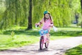Child on bike. Kids ride bicycle. Girl cycling. Royalty Free Stock Photo