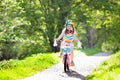 Child on bike. Kids ride bicycle. Girl cycling. Royalty Free Stock Photo